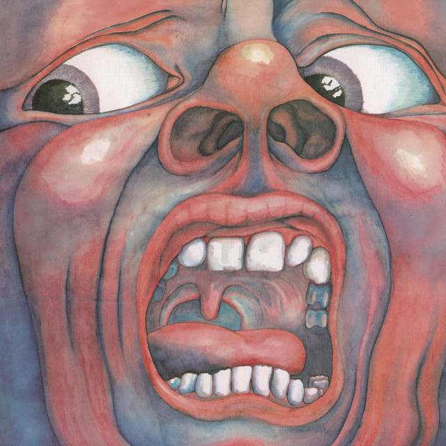 Canción The Court Of The Crimson King - Including "The Return of the Fire Witch" and "The Dance of the Puppets"