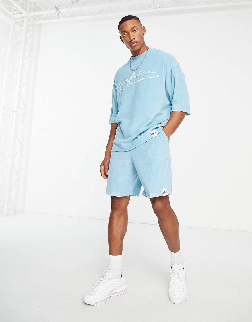 Pantalones cortos azul luminoso holgados con etiqueta del logo de tejido de