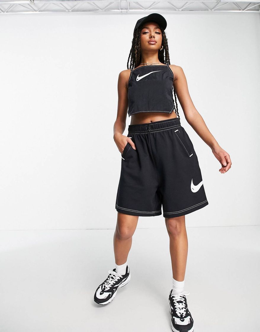Pantalones cortos negros con pespuntes en contraste y logo de felpa de Nike