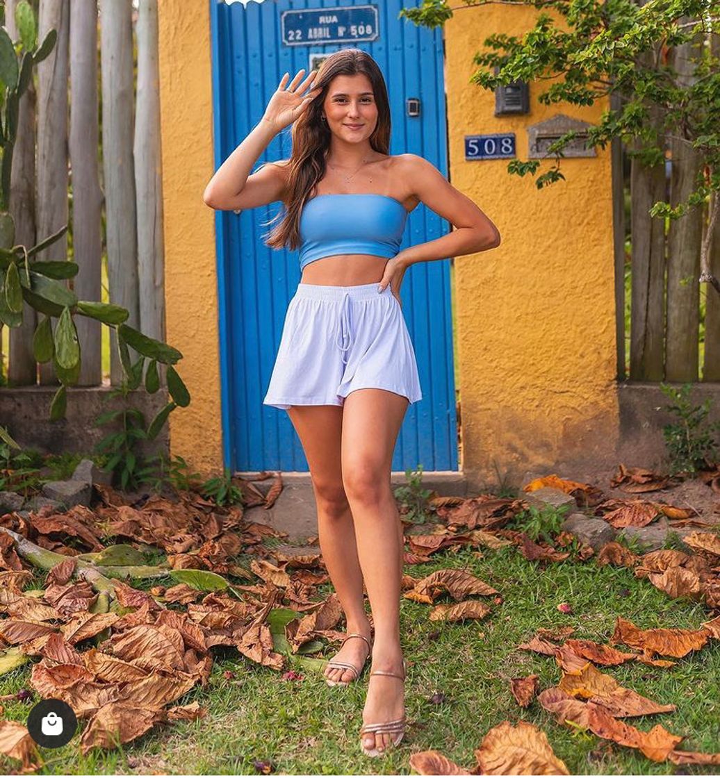 Producto Top faixa azul e short saia branco 