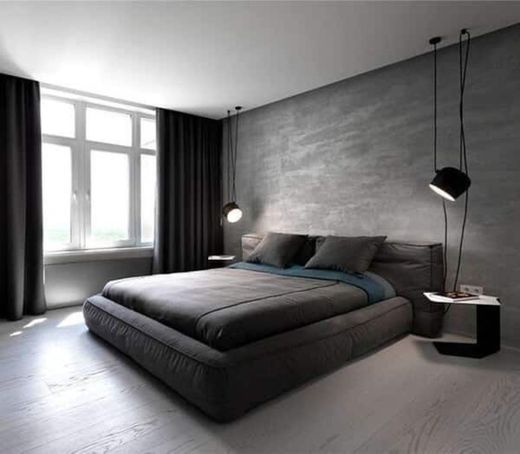 Um quarto minimalista todo cinza