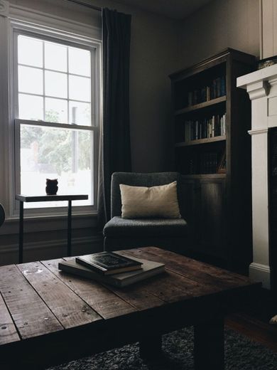 gray throw pillow on black chair by the window photo – Free Home ...