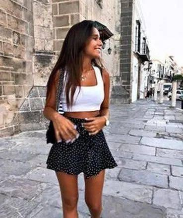 White top and black skirt