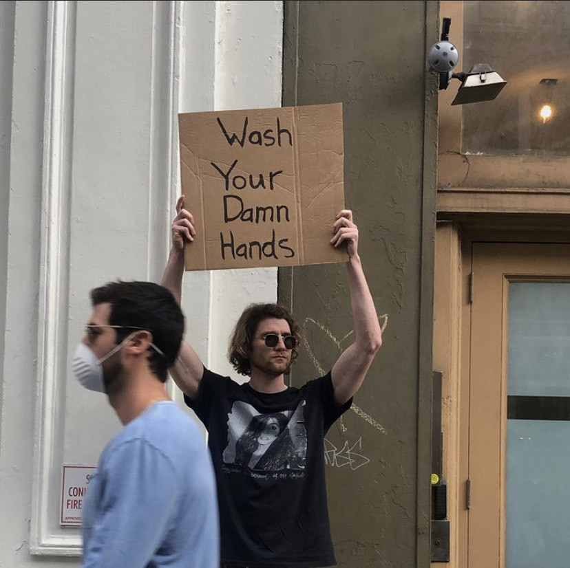 Fashion Dude with sign
