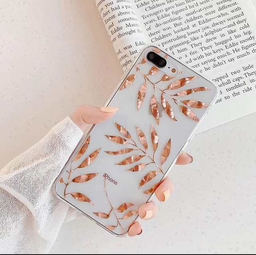 Capa de iPhone transparente com folhas douradas
