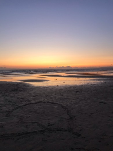 Ver o pôr do sol na praia