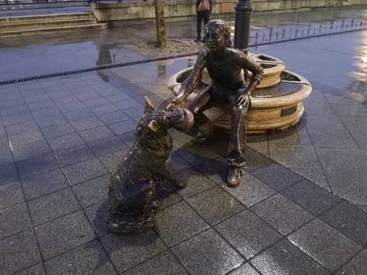 Girl With Her Dog Statue