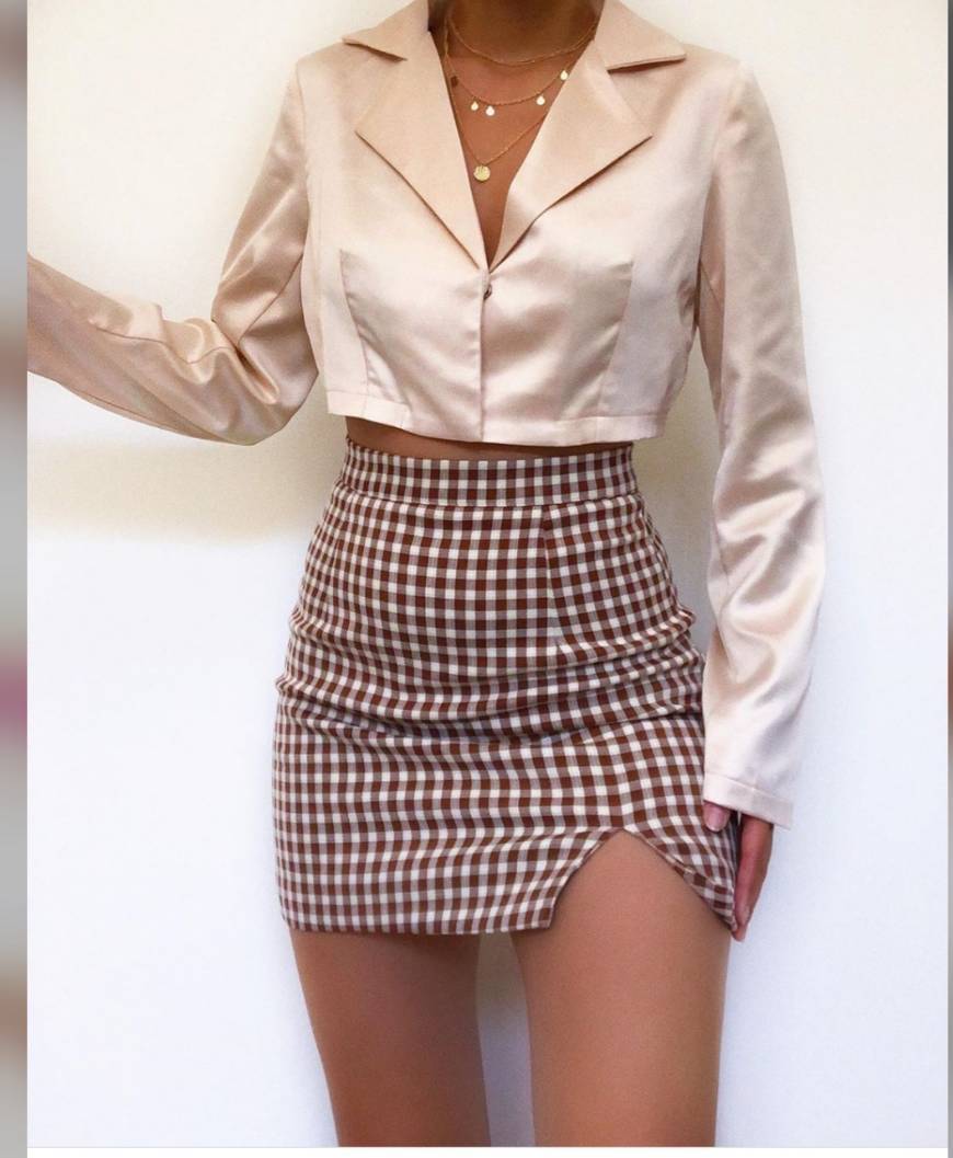 Fashion beige blouse with plaid skirt