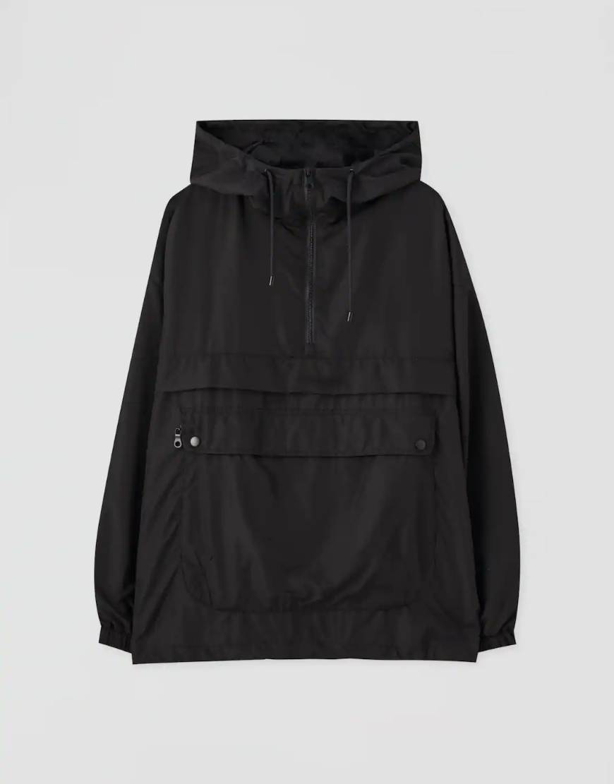 Social Blusão tipo canguru em preto com uma mala Pull and Bear 
