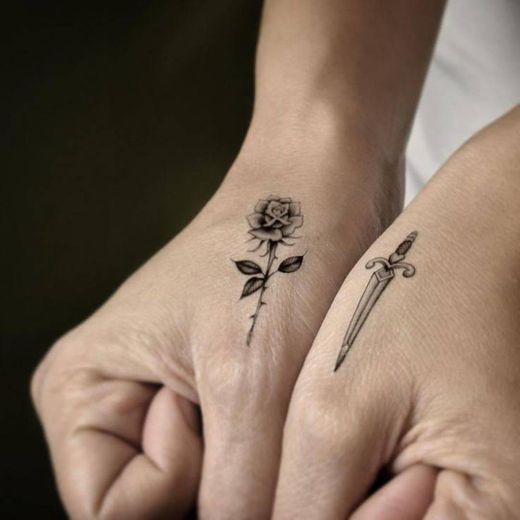 Small rose - sword tattoo