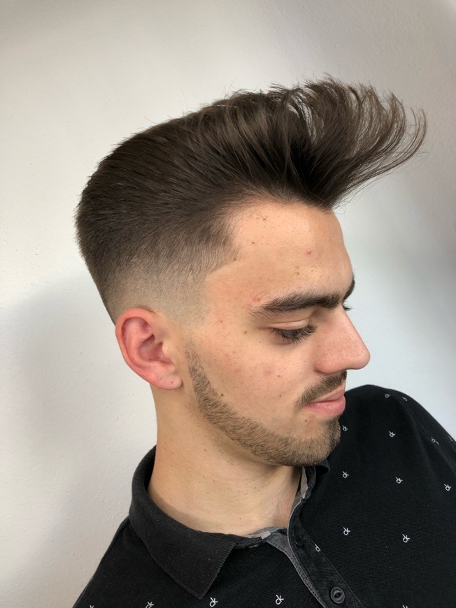 Moda High fade with long pompadour 