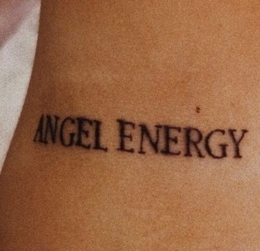 Angel energy tattoo