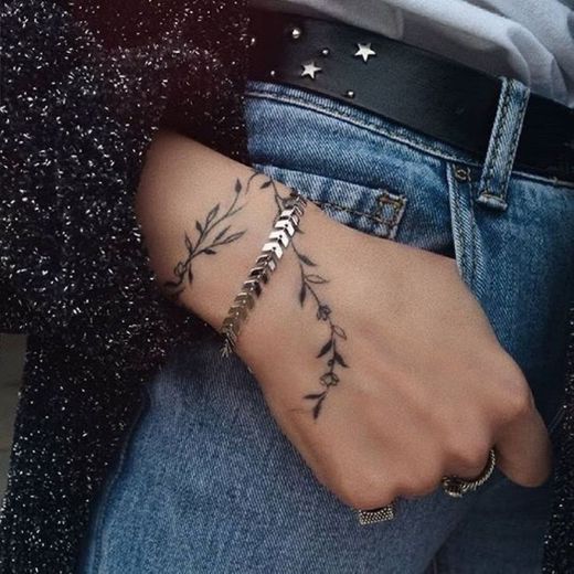 Flower wrist tattoo