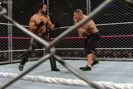 Cena vs Rollins en la jaula 