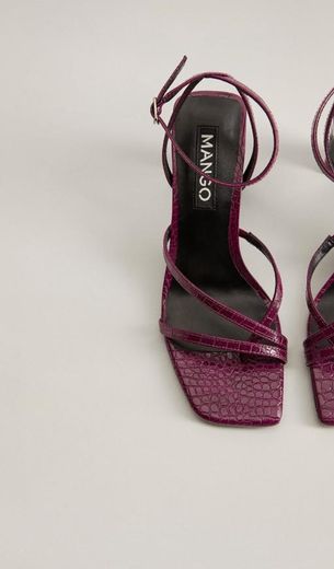 Croc-effect asymmetric sandals