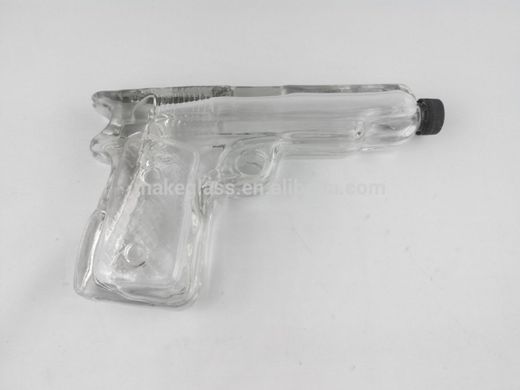 Botella de cristal con forma de pistola 🔫