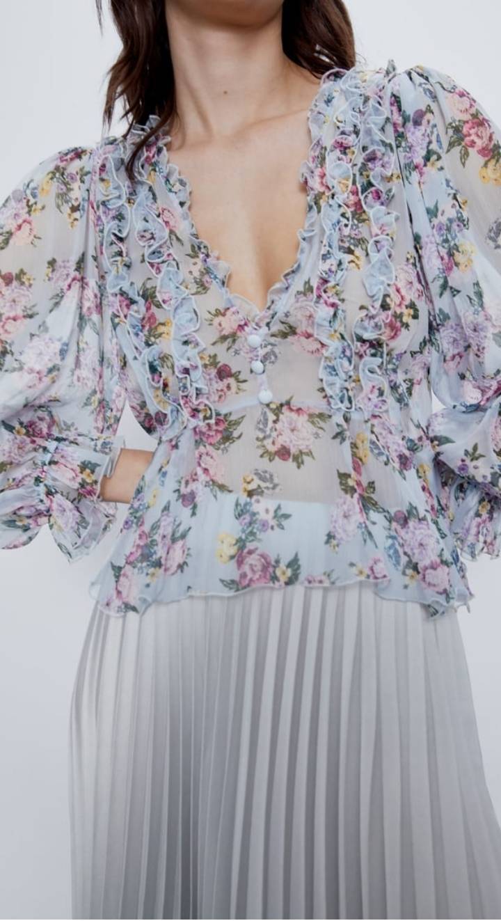 Producto Blusa em organza ás flores