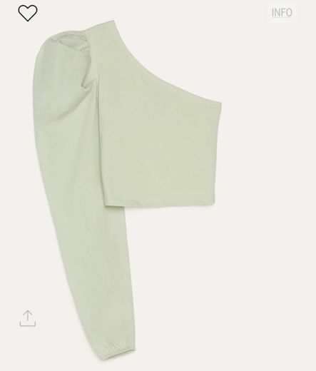 Blusa verde con una manga abullonada