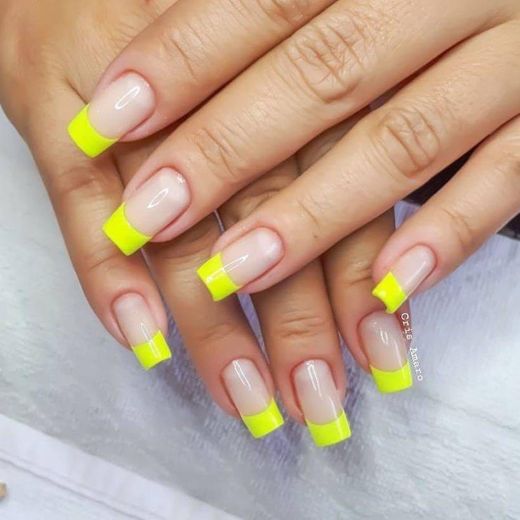 Neutral nail color with neon tips 