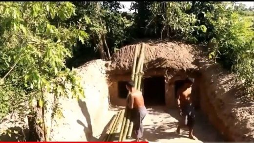 Primitive survival build house under root