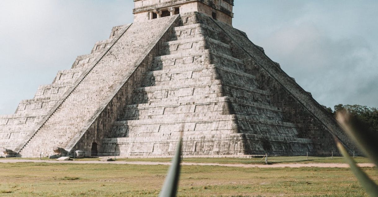 Gray Pyramid on Grass Field during Day · Free Stock Photo