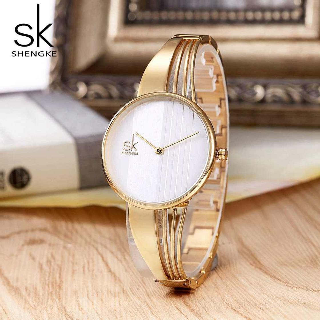 Product SHENGKE Señoras de la Moda Reloj Prism Fac Oro Malla de Acero