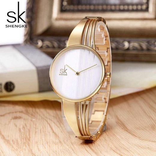 SHENGKE Señoras de la Moda Reloj Prism Fac Oro Malla de Acero