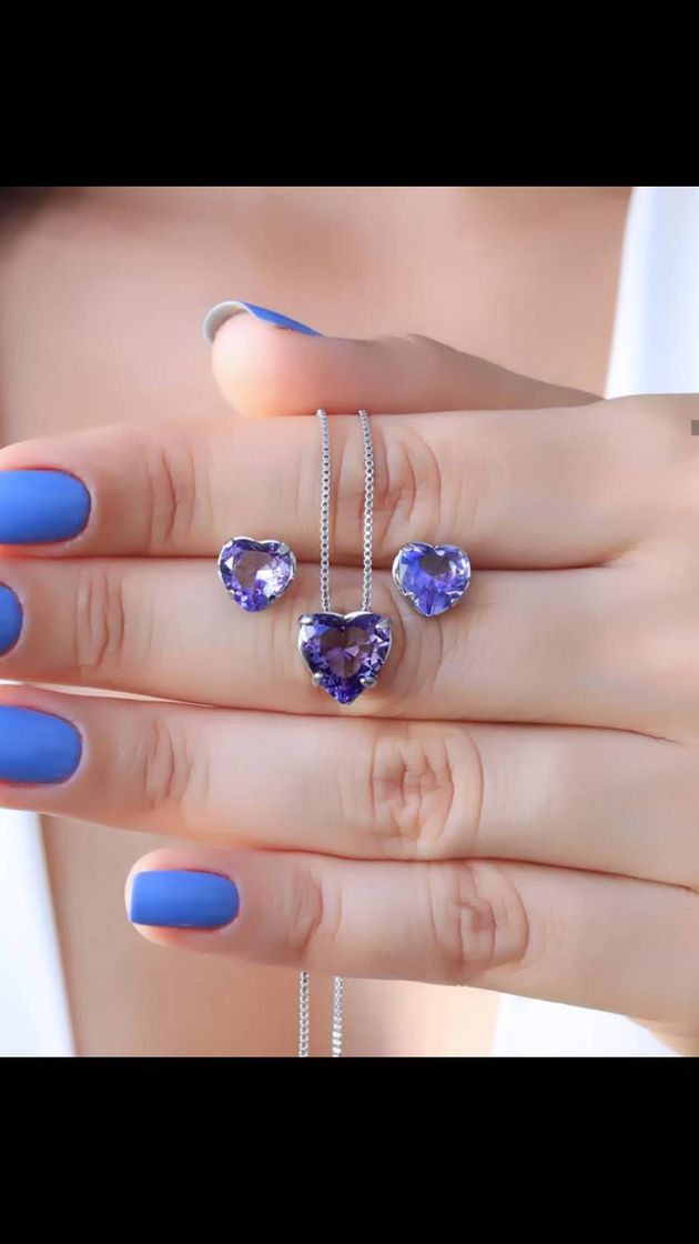 Moda Tanzanite heart set in white Rhodium plating.