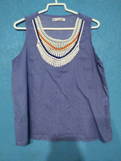 Blusa con escote tejido