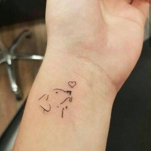 Small dog tattoo