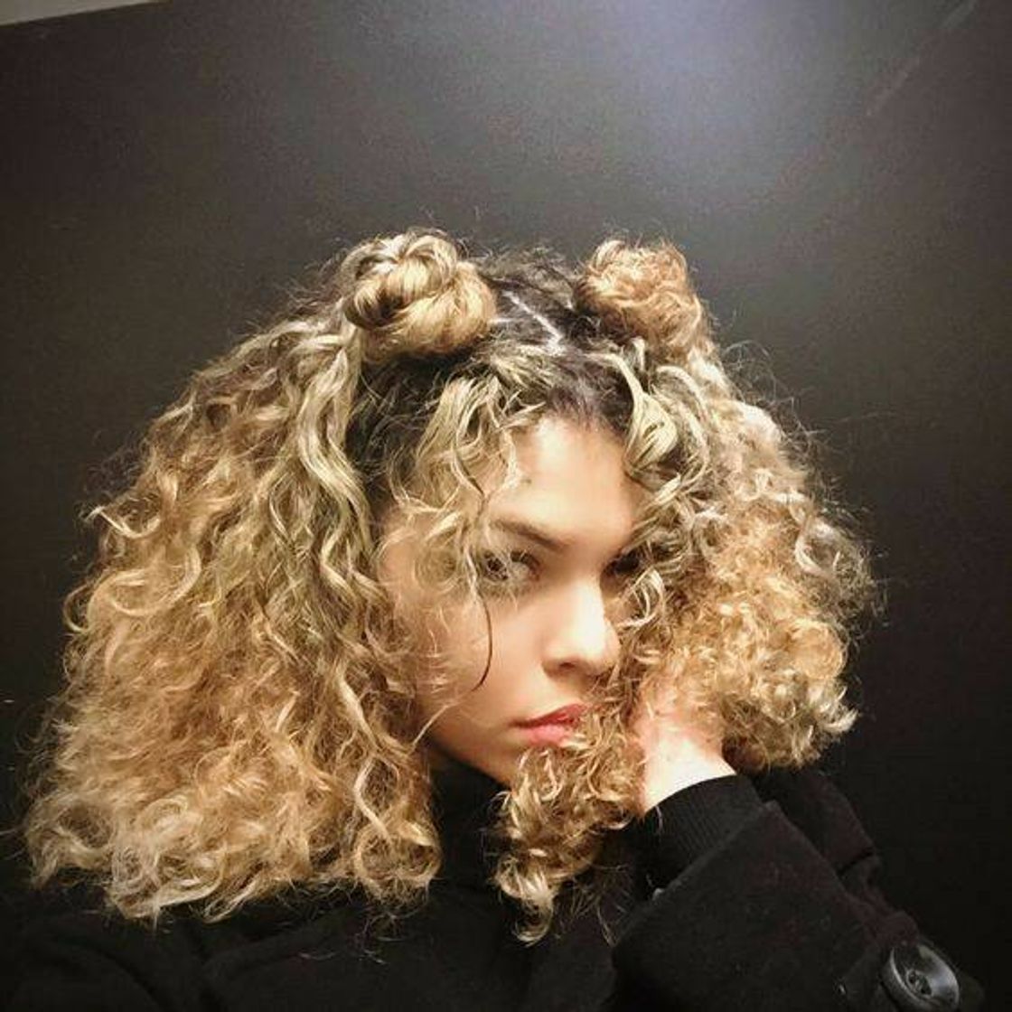 Fashion double bun for curly hair