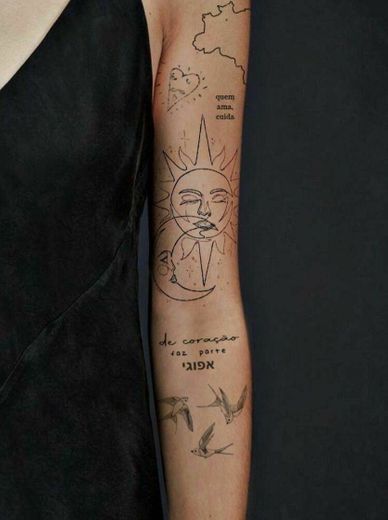Tatuagem no braço Sol e Lua