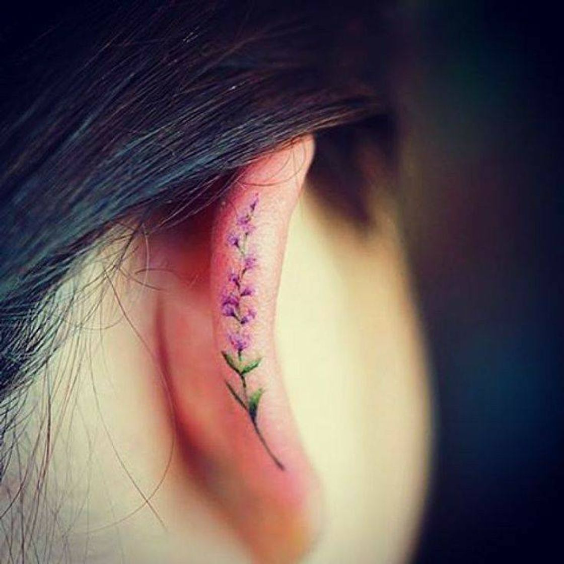 Social Ear flower tattoo