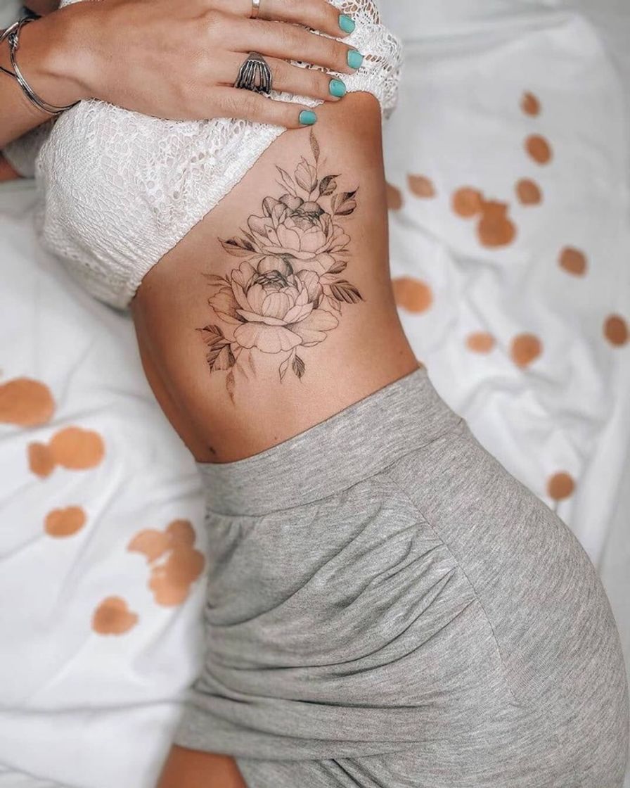 Moda Tatuagem costela 