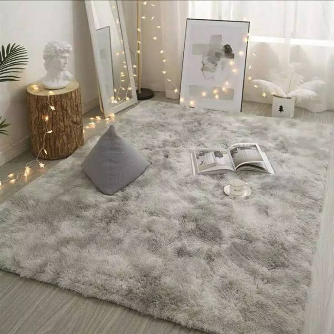 Alfombra gris pelitos