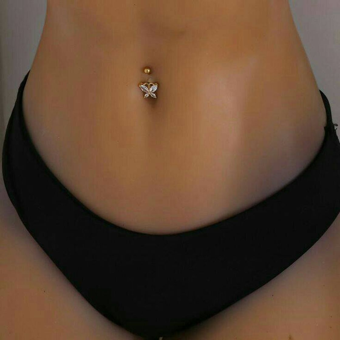 Moda piercing no umbigo