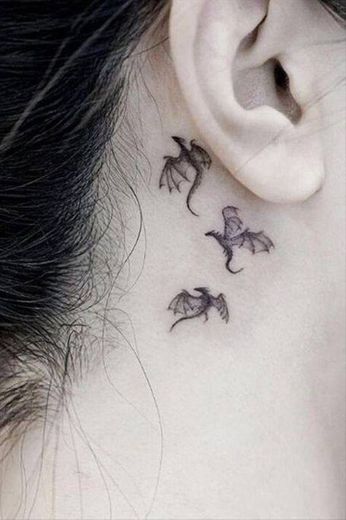 Tattoo minimalista dragão
