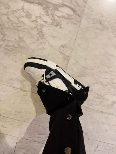 Black and white LV trainers 