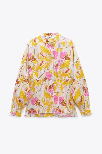 BLUSA ESTAMPADA CON NECESER 