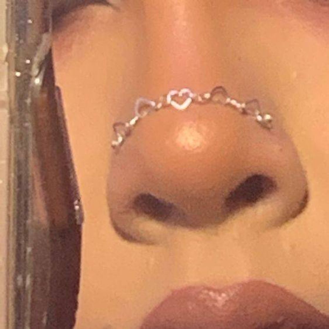 Social nose chain piercing 