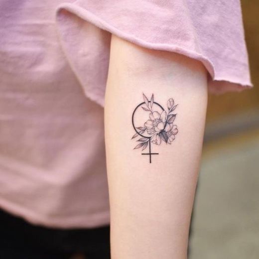 Empowering feminist tattoo