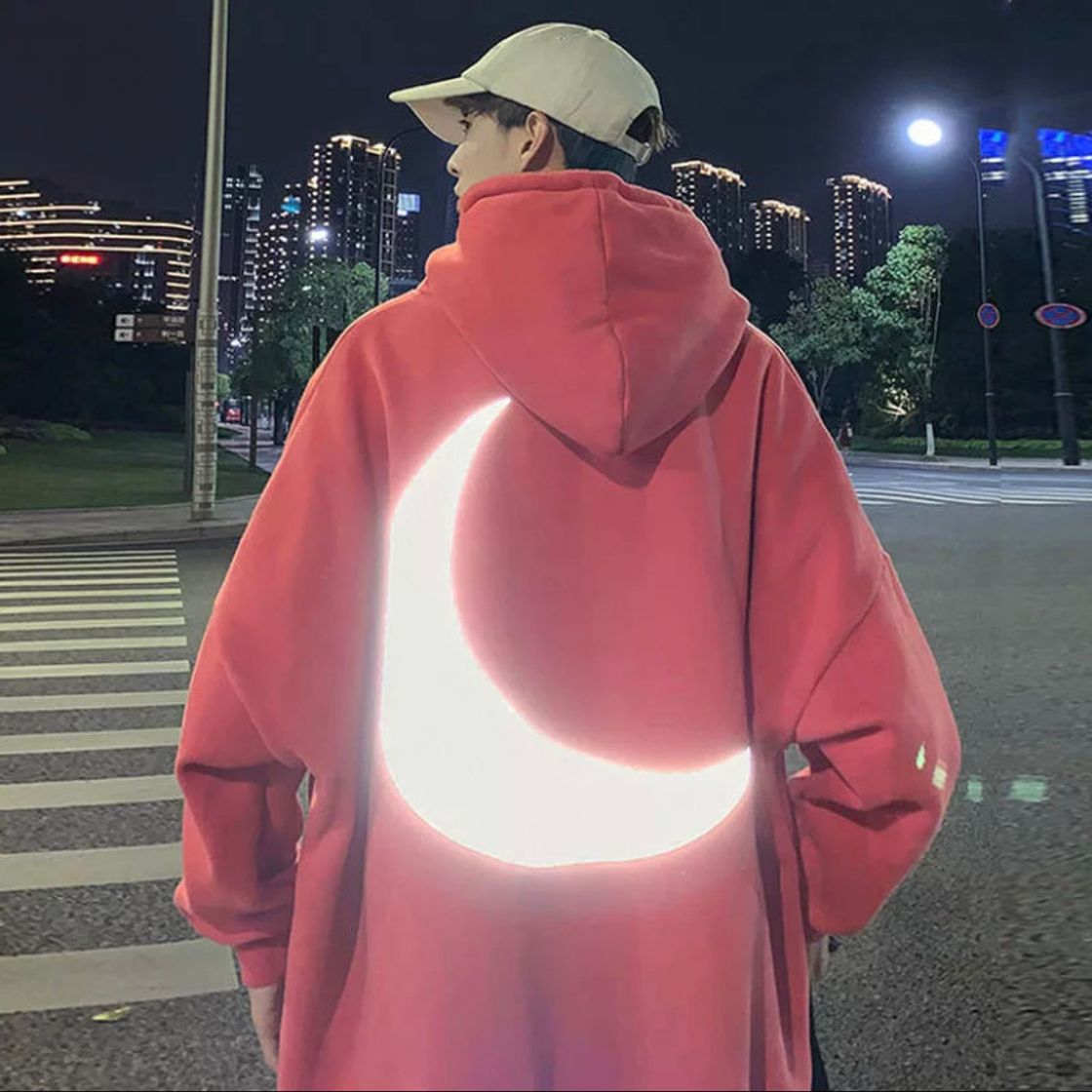 Moda Sudadera con luna reflectante