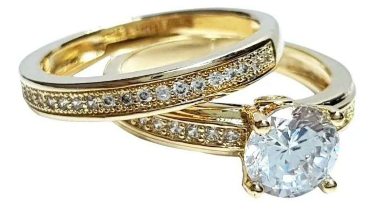 ANEL SOLITARIO E UM APARADOR NA MOEDA