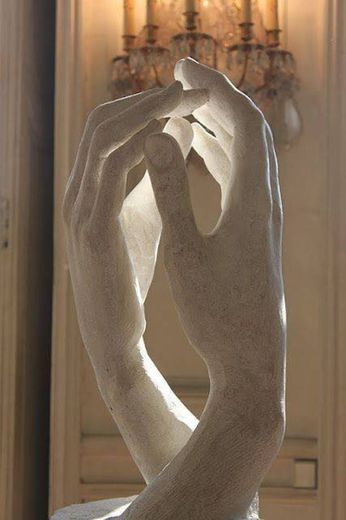 Escultura de manos