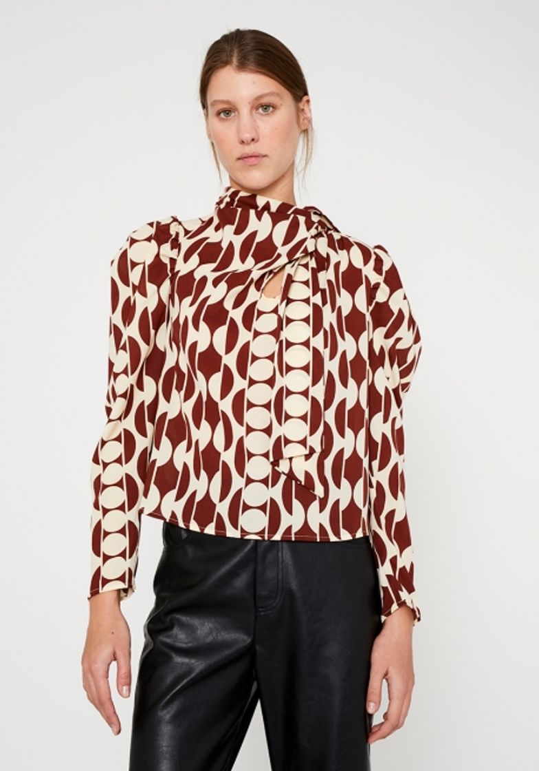 Social Blusa de cuello alto y lazada estampado geométrico