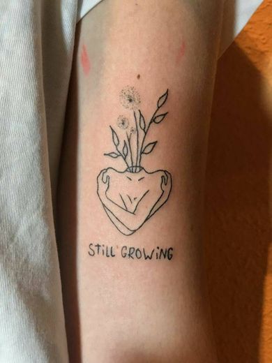 still growing tattoo 